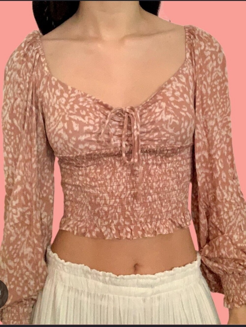 32. Urban Outfitters Leopard Romantic Top